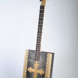 Cigar box guitar with gilded cross