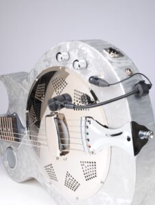 Mounted microphone on guitar with separate outs