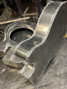 Resonator guitar body process. Finishing the welding