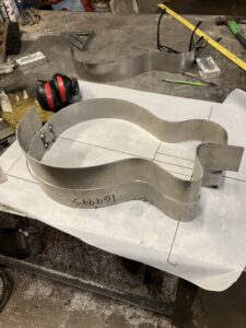 Resonator guitar body process. Checking the accuracy of the walls