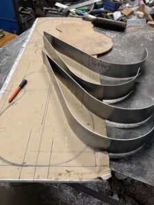 Resonator guitar body process. Beginning to form the sides