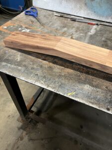 Guitar neck process. Finished scarf joint