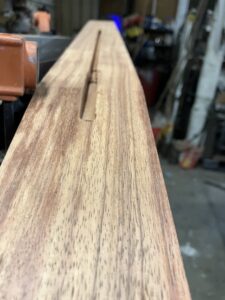 Guitar neck process. Truss rod channel
