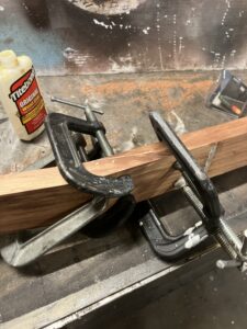 Guitar neck process. Gluing the scarf joint