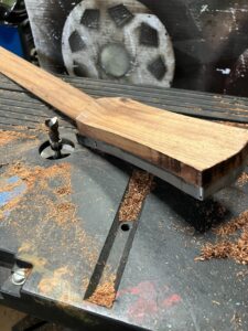 Guitar neck process. Shaping the headstock