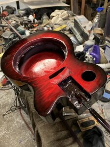 Resonator guitar body process. Painting.