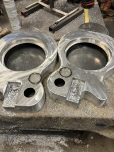 Resonator guitar bodies in process. The sound holes