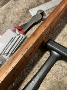 Guitar neck process. Setting the side dot markers