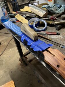 Guitar neck process. Fret leveling