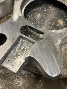 Resonator guitar process. Pickup cavity routed